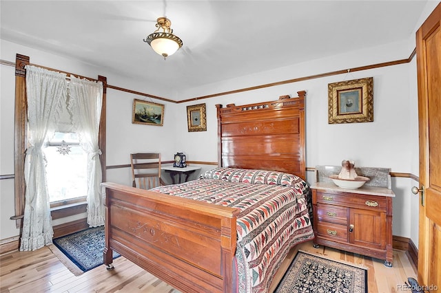 bedroom with light wood-type flooring