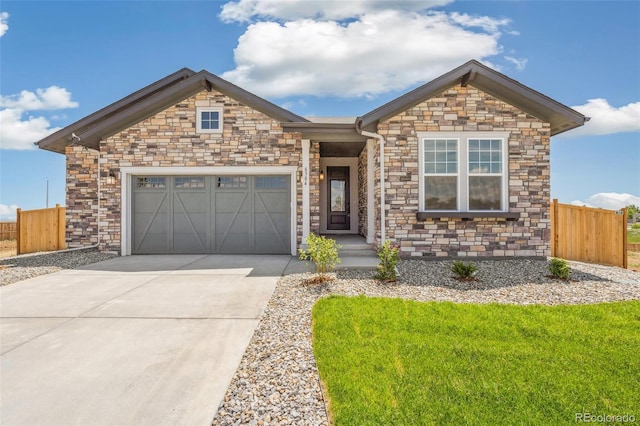6384 E 154th Pl, Thornton, CO 80602 - view of front facade featuring stone siding, an attached garage, and concrete driveway
