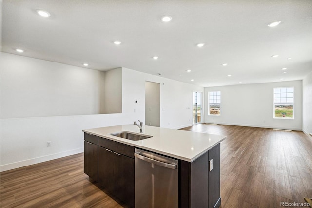 6384 E 154th Pl, Thornton, CO 80602 - kitchen with dishwasher, a sink, a kitchen island with sink, dark wood finished floors, and recessed lighting