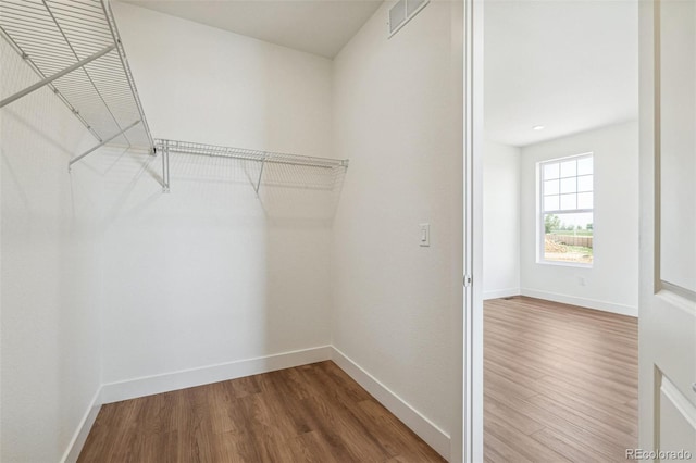 6384 E 154th Pl, Thornton, CO 80602 - walk in closet with wood finished floors