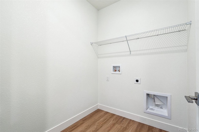 6384 E 154th Pl, Thornton, CO 80602 - laundry room with hookup for an electric dryer, hookup for a washing machine, baseboards, and wood finished floors