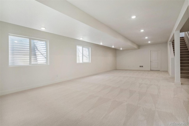 6384 E 154th Pl, Thornton, CO 80602 - below grade area featuring light colored carpet, stairway, recessed lighting, and baseboards