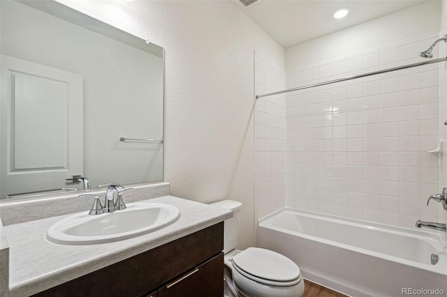 6384 E 154th Pl, Thornton, CO 80602 - bathroom with vanity, toilet, and tub / shower combination