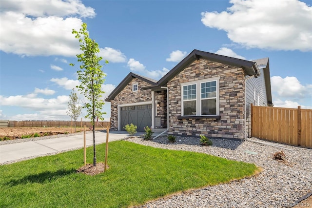 6384 E 154th Pl, Thornton, CO 80602 - view of front of property featuring stone siding, concrete driveway, and an attached garage