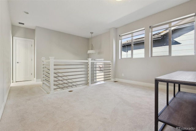 empty room featuring carpet flooring