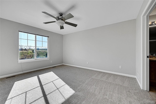 7511 S Sicily Way, Aurora, CO 80016 - carpeted spare room featuring ceiling fan and baseboards