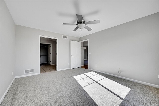 7511 S Sicily Way, Aurora, CO 80016 - unfurnished bedroom with carpet, baseboards, and ceiling fan