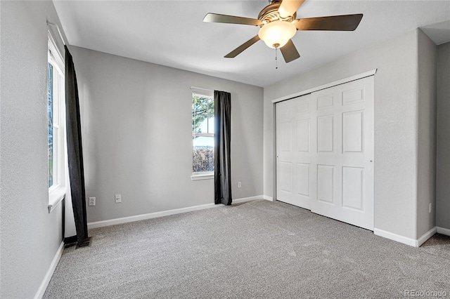 7511 S Sicily Way, Aurora, CO 80016 - unfurnished bedroom with carpet, a closet, baseboards, and ceiling fan