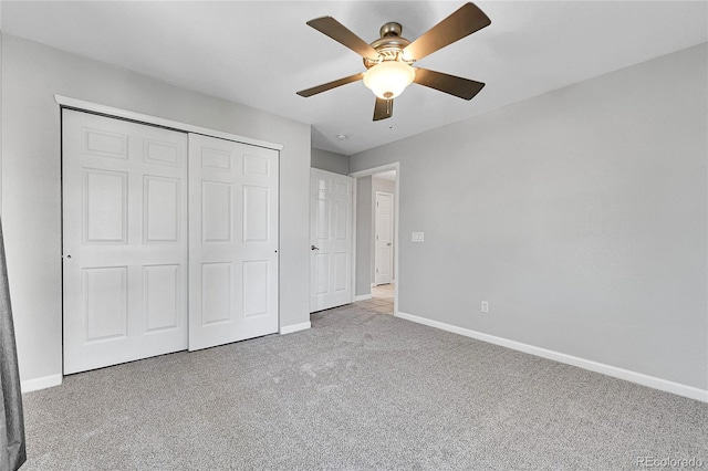 7511 S Sicily Way, Aurora, CO 80016 - unfurnished bedroom featuring baseboards, carpet flooring, a closet, and a ceiling fan