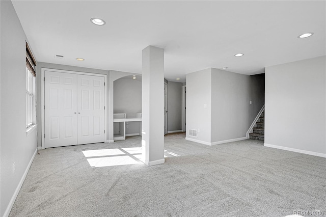7511 S Sicily Way, Aurora, CO 80016 - below grade area with carpet flooring, recessed lighting, stairway, and baseboards