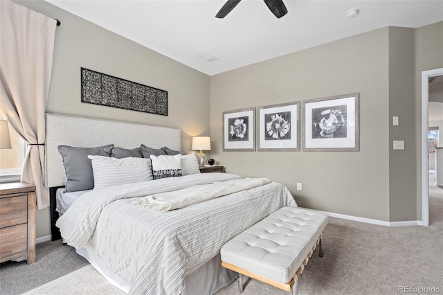 bedroom with ceiling fan and carpet flooring