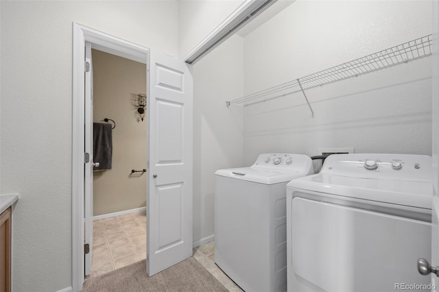 laundry area featuring separate washer and dryer