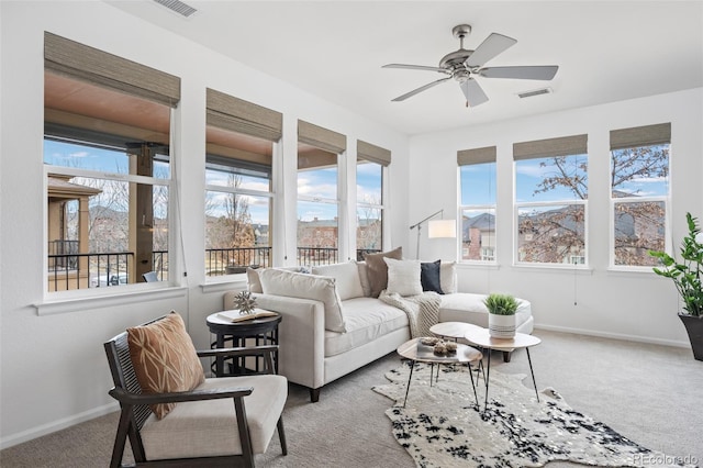 sunroom / solarium featuring ceiling fan and visible vents