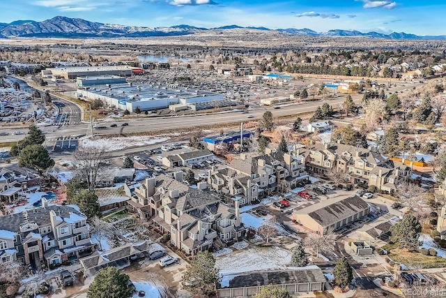 drone / aerial view featuring a mountain view