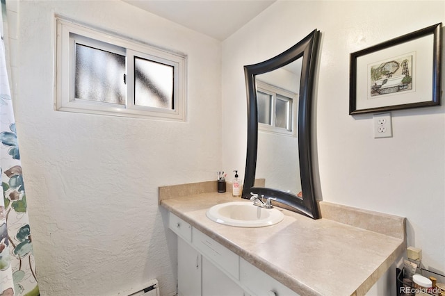 1512 E Monument St, Colorado Springs, CO 80909 - bathroom with vanity and a shower with curtain
