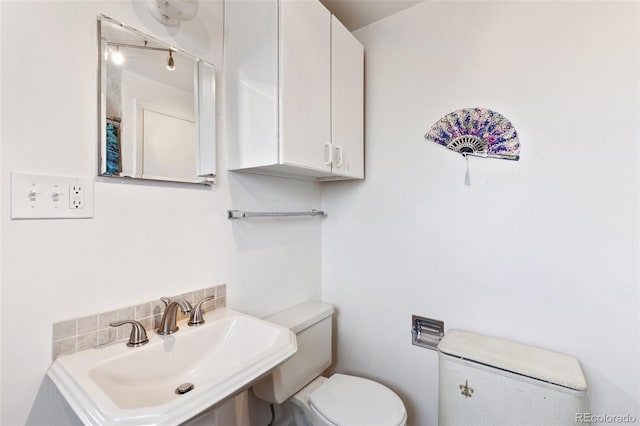 1512 E Monument St, Colorado Springs, CO 80909 - half bath with toilet and a sink