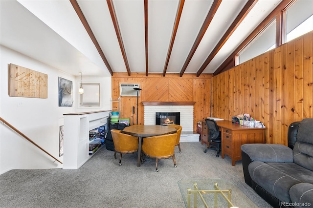 1512 E Monument St, Colorado Springs, CO 80909 - living area with carpet, a fireplace, wood walls, and a wall unit AC
