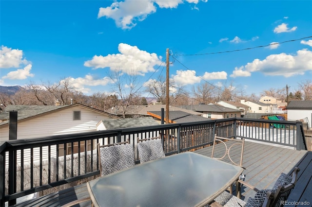 1512 E Monument St, Colorado Springs, CO 80909 - deck featuring outdoor dining area and a residential view