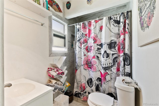 1512 E Monument St, Colorado Springs, CO 80909 - bathroom featuring toilet, curtained shower, and vanity