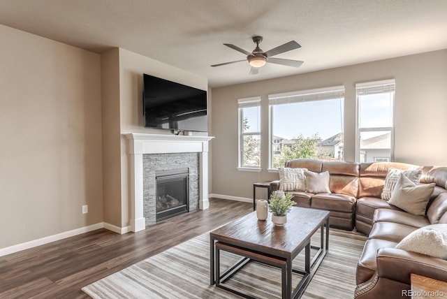 18875 W 93rd Ave, Arvada, CO 80007 - living area with ceiling fan, wood finished floors, and a fireplace