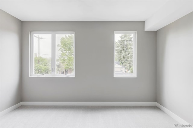 1541 Glencoe St, Denver, CO 80220 - unfurnished room with light carpet and baseboards