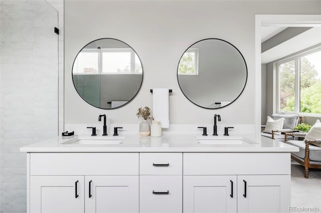 1541 Glencoe St, Denver, CO 80220 - bathroom featuring double vanity