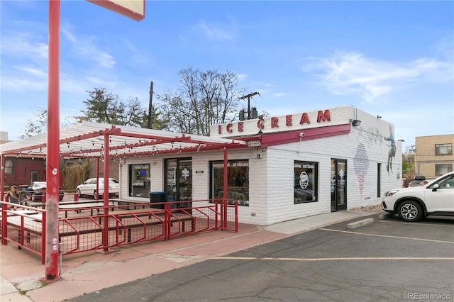 1541 Glencoe St, Denver, CO 80220 - view of property featuring uncovered parking