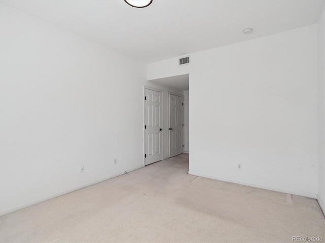 3855 Canyon Ranch Rd Unit 104, Highlands Ranch, CO 80126 - unfurnished room with light carpet and baseboards