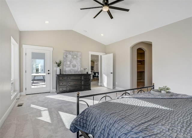 carpeted bedroom featuring ceiling fan and lofted ceiling