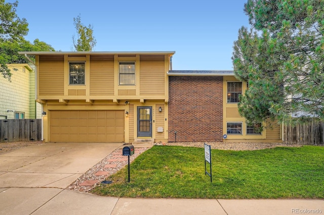 4049 S Nucla Way, Aurora, CO 80013 - view of front of house featuring a garage and concrete driveway