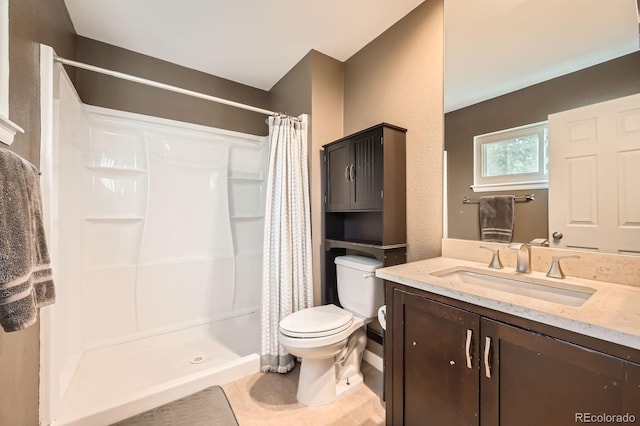 4049 S Nucla Way, Aurora, CO 80013 - full bathroom with vanity, curtained shower, and tile patterned floors