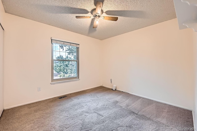 4049 S Nucla Way, Aurora, CO 80013 - carpeted spare room featuring a textured ceiling and ceiling fan