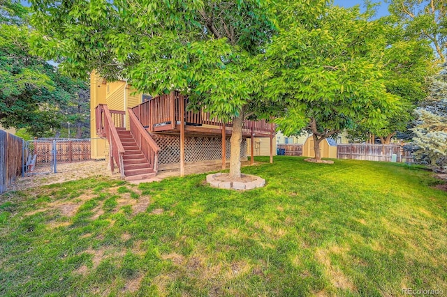 4049 S Nucla Way, Aurora, CO 80013 - fenced backyard with a storage shed, a wooden deck, and stairway