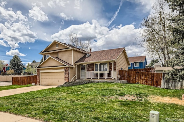 6057 S Pierson St, Littleton, CO 80127 - tri-level home featuring brick siding, covered porch, concrete driveway, and roof with shingles