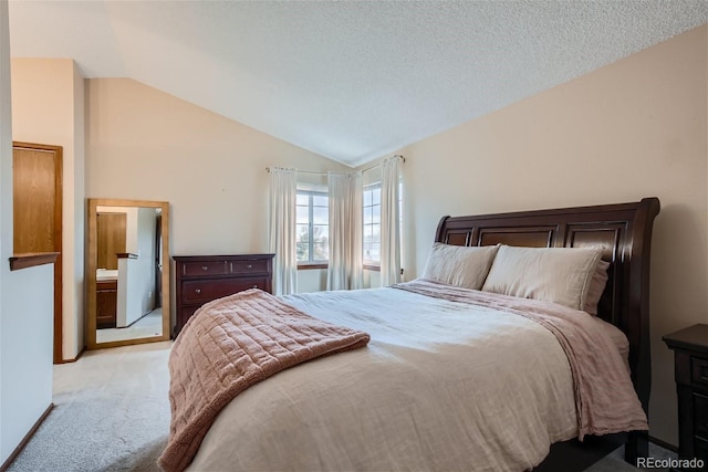 6057 S Pierson St, Littleton, CO 80127 - bedroom with carpet floors and vaulted ceiling
