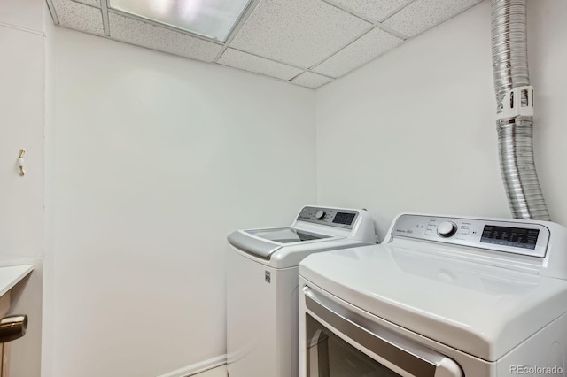 6057 S Pierson St, Littleton, CO 80127 - laundry area with washer and clothes dryer