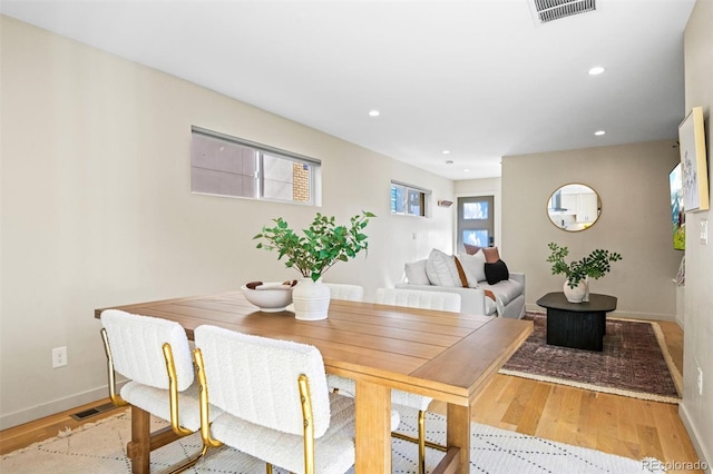 dining room featuring light hardwood / wood-style floors