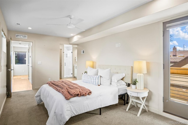 bedroom featuring ceiling fan and carpet