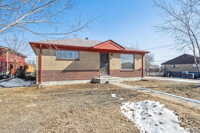 view of front of house with brick siding