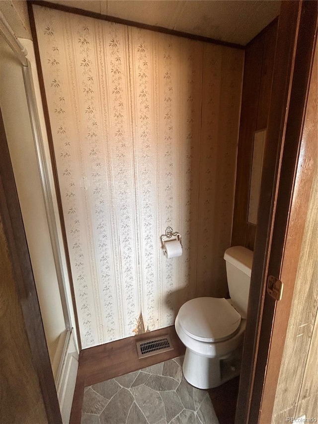 bathroom featuring toilet