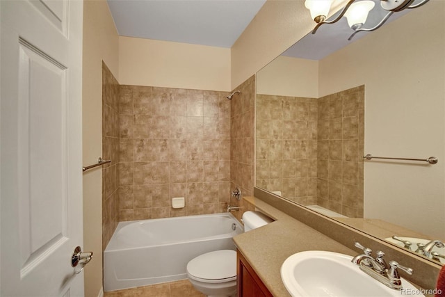 bathroom with shower / bathtub combination, vanity, toilet, and tile patterned floors