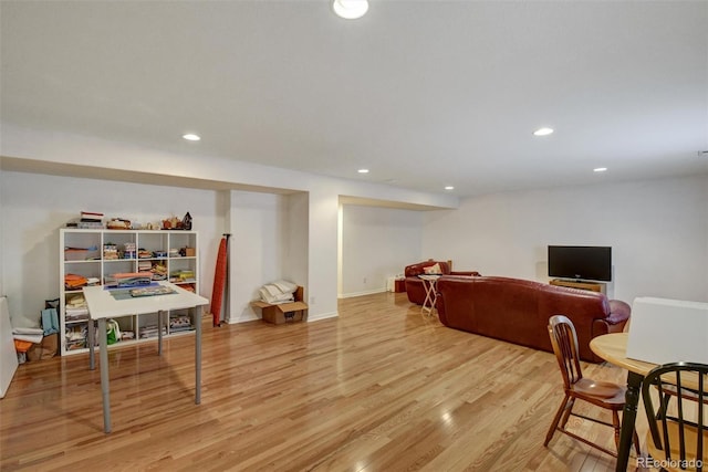 playroom with recessed lighting, baseboards, and wood finished floors