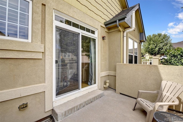 view of patio with a balcony