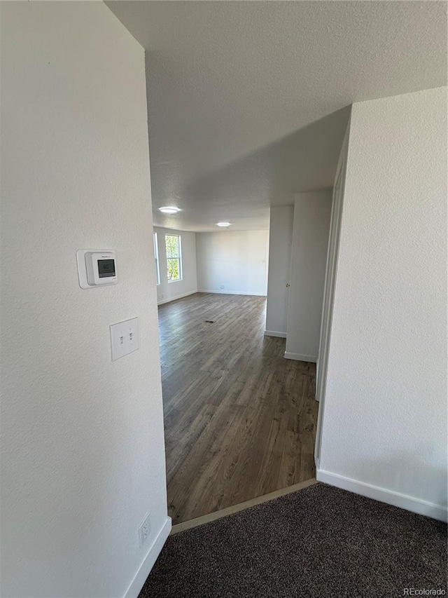 9036 Mandel St, Denver, CO 80260 - spare room featuring baseboards and wood finished floors