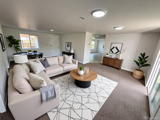 9036 Mandel St, Denver, CO 80260 - living area with light carpet, baseboards, and recessed lighting