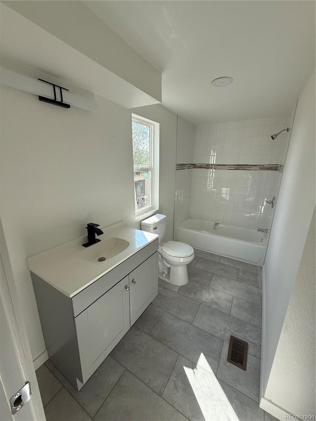 9036 Mandel St, Denver, CO 80260 - bathroom featuring toilet, shower / washtub combination, and vanity