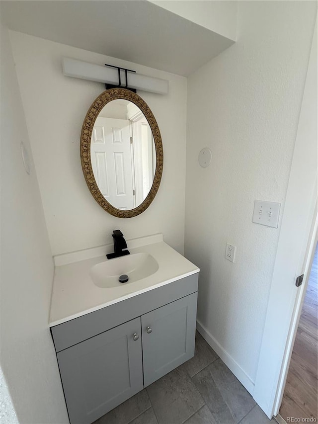 9036 Mandel St, Denver, CO 80260 - bathroom with vanity and baseboards
