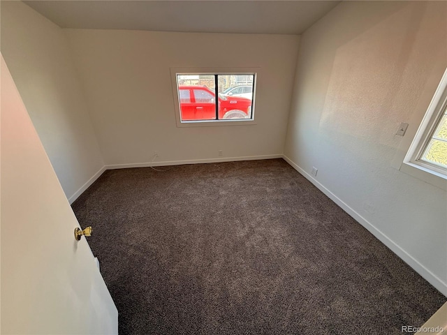 9036 Mandel St, Denver, CO 80260 - spare room with dark colored carpet and baseboards
