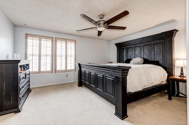 4356 S Blackhawk Way, Aurora, CO 80015 - bedroom with light carpet, a textured ceiling, and ceiling fan