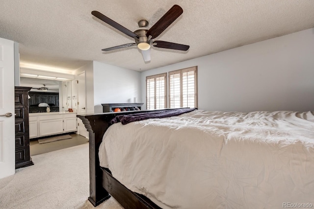 4356 S Blackhawk Way, Aurora, CO 80015 - bedroom featuring light colored carpet, a textured ceiling, and a ceiling fan